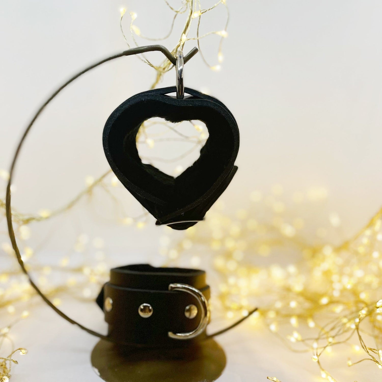 Black bondage restraint cuffs with fur lining