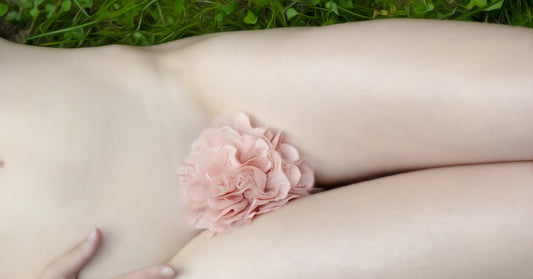 Women with flower on vulva - moving  towards pain-free sex