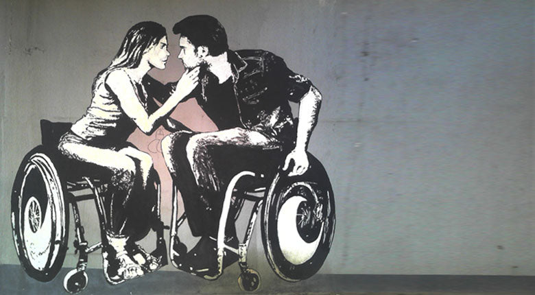 graffitti image of 2 people embrasing in wheelchairs