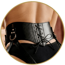 Leather corset-back harness on a model, shown from the back