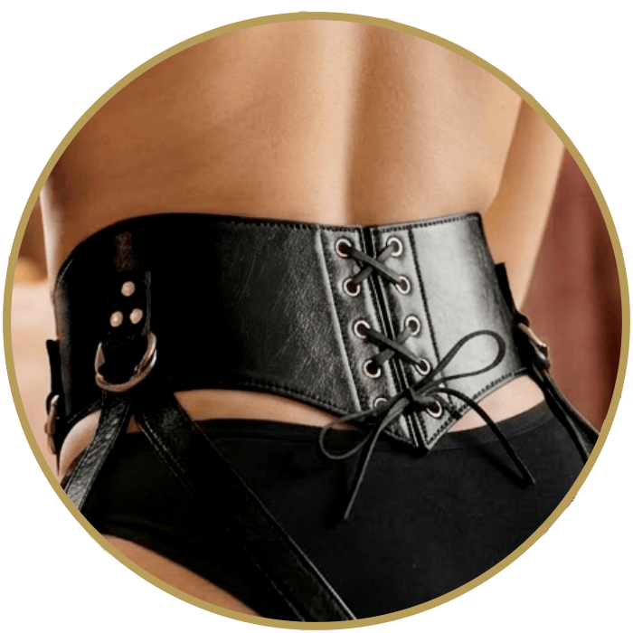 Black leather  strap-on harness with corset lacing, shown on a model