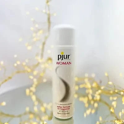 Silicone lube bottle with decorative lights in the background